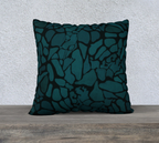 Decorative pillow with abstract pattern on a wooden surface and light gray wall background