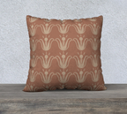 Decorative pillow with a geometric pattern on a wooden surface and textured wall background
