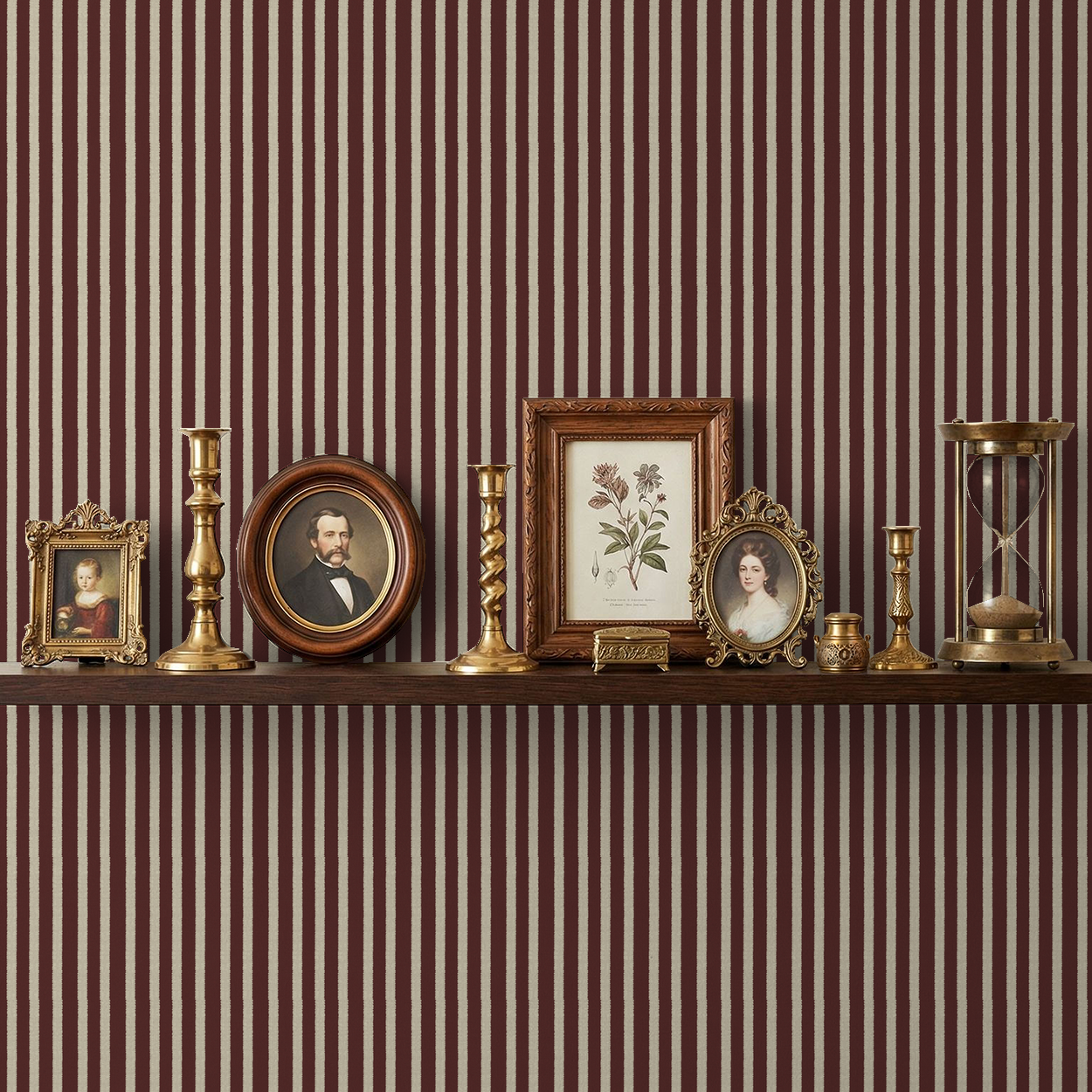Maroon striped wallpaper with vintage decor on a shelf, creating a warm, elegant ambiance.