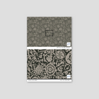 Suzani floral green wallpaper with intricate patterns on a black background.